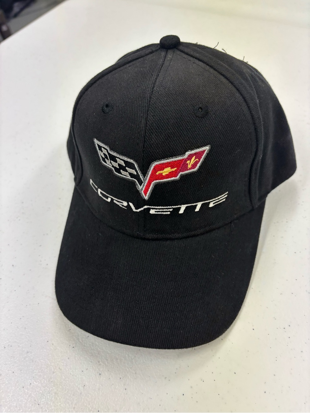 CORVETTE BASEBALL HAT CAP
DOUBLE RACING FLAGS
ONE SIZE  BLACK